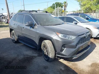 2021 Toyota RAV4 Hybrid XSE with VIN 2T3E6RFV8MW006805, listed as a IAAI auction lot 41973250 with 77,483 mi miles and . Bid and sale history available at DreamBid. Image 1.