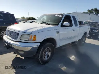 2001 Ford F-150 XL z VIN 1FTRX18W21KA51796, wystawiony jako Copart lot #58534145 z przebiegiem 180 673 mil mil oraz Czysty tytuł • Clean title. Historia ofert i sprzedaży dostępna na DreamBid. Obrazek 1.