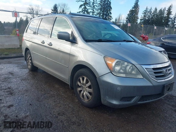 2010 Honda Odyssey EX-L with VIN 5FNRL3H70AB027137, listed as a IAAI auction lot 41659981 with 202,256 mi miles and . Bid and sale history available at DreamBid. Image 1.