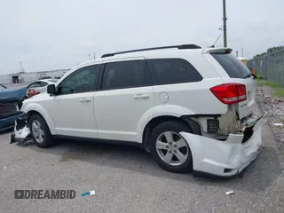 2012 Dodge Journey SXT with VIN 3C4PDCBG8CT371543, listed as a IAAI auction lot 42337728 with 174,615 mi miles and . Bid and sale history available at DreamBid. Image 14.