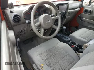 2009 Jeep Wrangler X z VIN 1J4FA24139L740959, wystawiony jako Copart lot #56509075 z przebiegiem 121 927 mil mil oraz Szkoda całkowita • Salvage title. Historia ofert i sprzedaży dostępna na DreamBid. Obrazek 8.