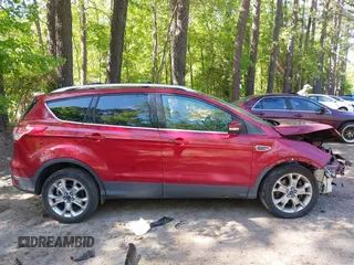 2014 Ford Escape Titanium with VIN 1FMCU9JX7EUB68165, listed as a IAAI auction lot 42141235 with 172,041 mi miles and . Bid and sale history available at DreamBid. Image 14.