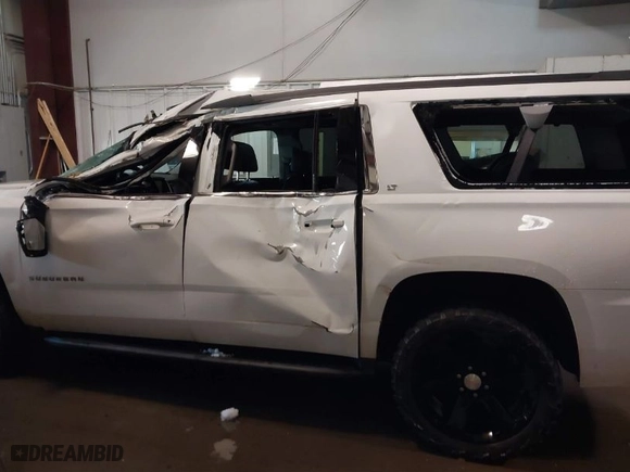 2017 Chevrolet Suburban LT with VIN 1GNSKHKCXHR328405, listed as a IAAI auction lot 41353035 with NaN miles. Bid and sale history available at carsss.com. Image 14.