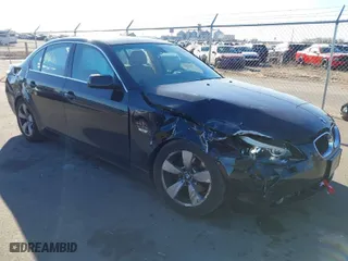 2005 BMW 5 Series 525i with VIN WBANA53515B864703, listed as a IAAI auction lot 41461933 with 144,851 mi miles. Bid and sale history available at carsss.com. Image 1.