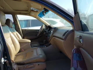 2005 Acura MDX Touring with VIN 2HNYD18985H520296, listed as a IAAI auction lot 41133862 with 173,318 mi miles. Bid and sale history available at carsss.com. Image 5.
