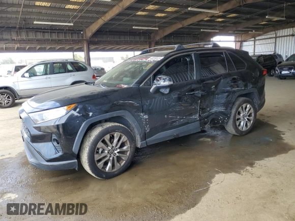 2019 Toyota RAV4 XLE Premium with VIN JTMA1RFV5KD026145, listed as a Copart auction lot 48238125 with 101,443 mi miles and Salvage Title. Bid and sale history available at carsss.com. Image 1.
