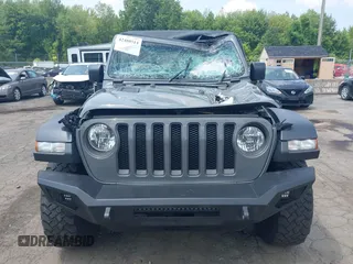 2021 Jeep Wrangler Unlimited Rubicon with VIN 1C4HJXFN3MW816375, listed as a IAAI auction lot 42480514 with 62,324 mi miles and . Bid and sale history available at DreamBid. Image 12.