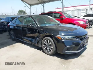 2022 Honda Civic EX with VIN JHMFE1F7XNX001014, listed as a IAAI auction lot 42595900 with 30,102 mi miles and . Bid and sale history available at DreamBid. Image 1.