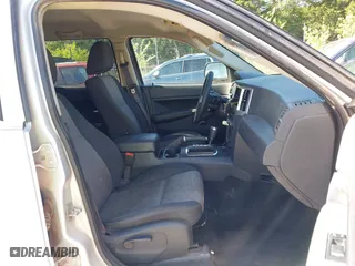 2009 Jeep Grand Cherokee Laredo with VIN 1J8GS48K99C528145, listed as a IAAI auction lot 42077024 with 167,588 mi miles. Bid and sale history available at carsss.com. Image 5.