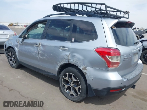 2014 Subaru Forester XT Touring with VIN JF2SJGPC2EH458390, listed as a IAAI auction lot 41923959 with 113,170 mi miles and . Bid and sale history available at DreamBid. Image 3.