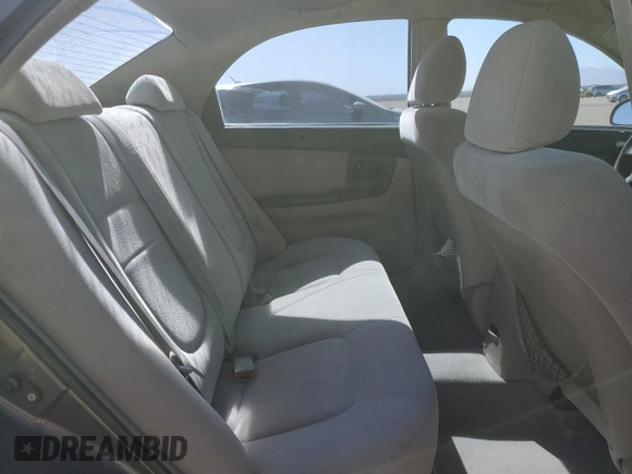 2006 Kia Spectra EX with VIN KNAFE122X65277053, listed as a Copart auction lot 75697314 with 147,156 mi miles and Salvage Title. Bid and sale history available at carsss.com. Image 10.