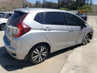 2018 Honda Fit EX with VIN 3HGGK5H88JM719092, listed as a Copart auction lot 61271925 with 86,516 mi miles and Salvage title. Bid and sale history available at DreamBid. Image 3.