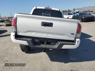 2020 Toyota Tacoma SR5 with VIN 3TMAZ5CN8LM115056, listed as a Copart auction lot 46948805 with 87,713 mi miles and Salvage title. Bid and sale history available at DreamBid. Image 6.