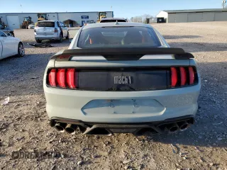 2021 Ford Mustang Mach 1 with VIN 1FA6P8R06M5551345, listed as a Copart auction lot 86491604 with 7,374 mi miles and Salvage Title. Bid and sale history available at carsss.com. Image 6.