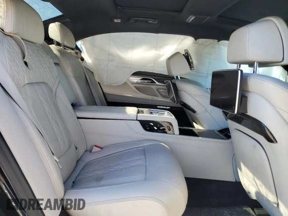 2018 BMW 7 Series 750i with VIN WBA7F0C50JGM23350, listed as a Copart auction lot 80530694 with 0 mi miles and Salvage Title. Bid and sale history available at carsss.com. Image 10.