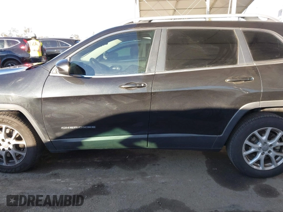 2015 Jeep Cherokee Latitude with VIN 1C4PJLCB7FW632624, listed as a IAAI auction lot 41413648 with 110,274 mi miles. Bid and sale history available at carsss.com. Image 13.