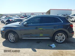 2018 Audi Q5 Premium Plus z VIN WA1BNAFY8J2105219, wystawiony jako IAAI lot #41991915 z przebiegiem 80 732 mil mil oraz . Historia ofert i sprzedaży dostępna na DreamBid. Obrazek 14.
