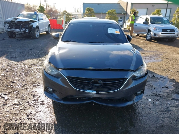 2014 Mazda 6 i Grand Touring with VIN JM1GJ1W50E1107877, listed as a IAAI auction lot 41857596 with 166,188 mi miles and . Bid and sale history available at DreamBid. Image 13.