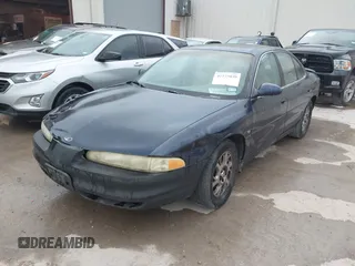 2000 Oldsmobile Intrigue GLS z VIN 1G3WX52H5YF182762, wystawiony jako IAAI lot #42273039 z przebiegiem 223 471 mil mil oraz . Historia ofert i sprzedaży dostępna na DreamBid. Obrazek 2.