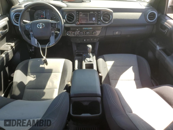 2021 Toyota Tacoma 4WD SR5 with VIN 3TMDZ5BN9MM099787, listed as a Copart auction lot 49717425 with 56,374 mi miles and Salvage Title. Bid and sale history available at carsss.com. Image 8.