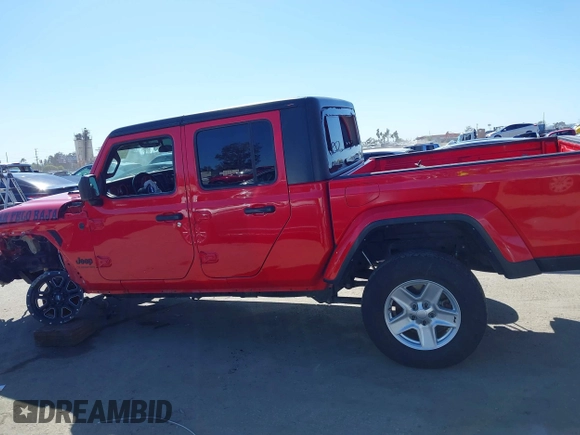 2022 Jeep Gladiator Willys Sport z VIN 1C6HJTAG0NL180848, wystawiony jako IAAI lot #41778129 z przebiegiem Nie podano mil oraz . Historia ofert i sprzedaży dostępna na DreamBid. Obrazek 15.