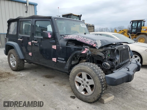 2015 Jeep Wrangler Unlimited Willys Wheeler with VIN 1C4BJWDG3FL601197, listed as a Copart auction lot 53832465 with 216,141 mi miles and Salvage Title. Bid and sale history available at DreamBid. Image 4.