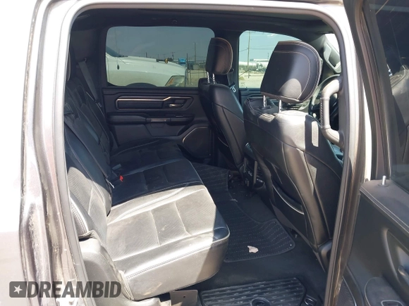 2021 Ram 1500 Limited with VIN 1C6SRFHT8MN640179, listed as a IAAI auction lot 41976594 with 91,756 mi miles and . Bid and sale history available at DreamBid. Image 8.