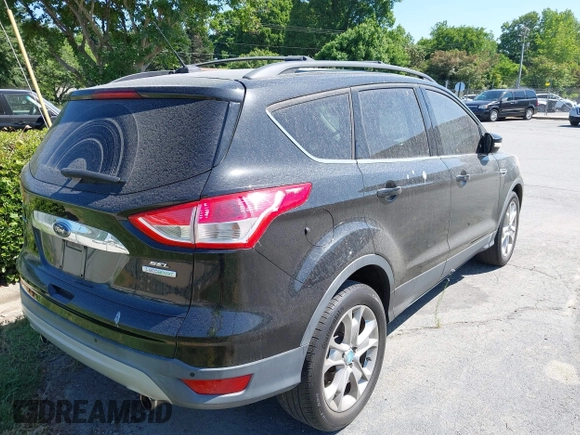 2013 Ford Escape SEL with VIN 1FMCU0HX8DUB38480, listed as a IAAI auction lot 42176271 with 154,309 mi miles. Bid and sale history available at carsss.com. Image 4.