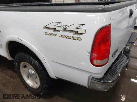 1998 Ford F-150 с VIN 1FTRX18L1WKB99239, выставлен на аукционе IAAI как лот 41987823 с пробегом 217 930 миль миль и . История ставок и продаж доступна на DreamBid. Изображение 6.