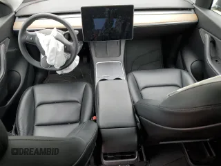 2021 Tesla Model Y Long Range z VIN 5YJYGDEE0MF254020, wystawiony jako Copart lot #51666865 z przebiegiem 25 805 mil mil oraz Szkody całkowita. Historia ofert i sprzedaży dostępna na DreamBid. Obrazek 8.