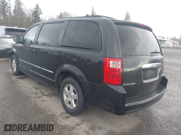 2009 Dodge Grand Caravan SXT z VIN 2D8HN54119R569142, wystawiony jako IAAI lot #42000421 z przebiegiem 161 717 mil mil oraz . Historia ofert i sprzedaży dostępna na DreamBid. Obrazek 3.
