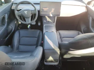 2022 Tesla Model Y Performance z VIN 7SAYGDEF3NF446769, wystawiony jako Copart lot #83702074 z przebiegiem 32 895 mil mil oraz Szkoda całkowita • Salvage title. Historia ofert i sprzedaży dostępna na DreamBid. Obrazek 8.