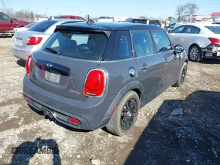 2015 MINI Hardtop 4 Door S with VIN WMWXU3C52F2B56517, listed as a IAAI auction lot 41437491 with 111,916 mi miles and . Bid and sale history available at DreamBid. Image 4.