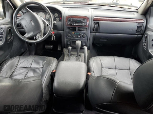 2004 Jeep Grand Cherokee Limited with VIN 1J4GW58N64C174387, listed as a Copart auction lot 43539585 with 138,433 mi miles and Salvage title. Bid and sale history available at DreamBid. Image 8.