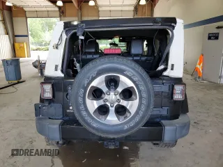 2016 Jeep Wrangler Unlimited Sahara с VIN 1C4HJWEG3GL235476, выставлен на аукционе Copart как лот 63342605 с пробегом 133 785 миль миль и Списание • Salvage title. История ставок и продаж доступна на DreamBid. Изображение 6.