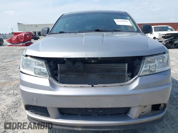 2015 Dodge Journey SE z VIN 3C4PDCAB0FT698674, wystawiony jako IAAI lot #42308994 z przebiegiem 97 640 mil mil oraz . Historia ofert i sprzedaży dostępna na DreamBid. Obrazek 6.