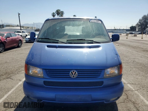 2003 Volkswagen EuroVan с VIN WV2KB470X3H028721, выставлен на аукционе Copart как лот 57531425 с пробегом 233 629 миль миль и Чистый • Clean title. История ставок и продаж доступна на DreamBid. Изображение 5.