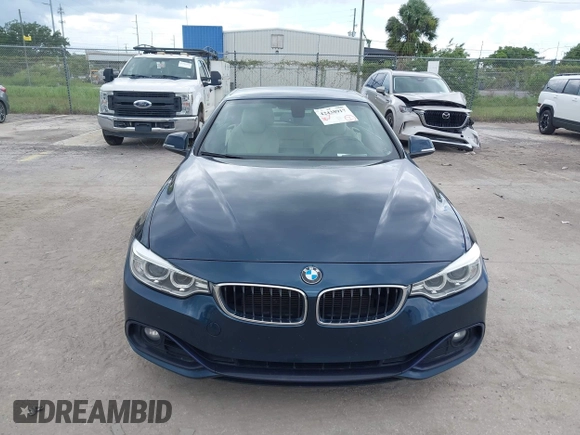 2016 BMW 4 Series 428i z VIN WBA3V7C57G5A28082, wystawiony jako IAAI lot #42438917 z przebiegiem 118 464 mil mil oraz . Historia ofert i sprzedaży dostępna na DreamBid. Obrazek 6.