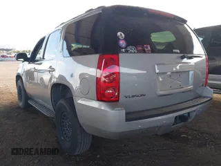 2007 GMC Yukon SLE with VIN 1GKFK13057J108533, listed as a IAAI auction lot 41364196 with 207,890 mi miles. Bid and sale history available at carsss.com. Image 3.
