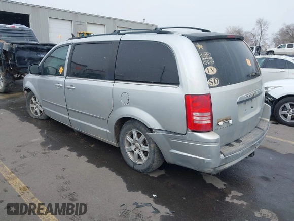 2010 Chrysler Town & Country Touring with VIN 2A4RR5D12AR208914, listed as a IAAI auction lot 41529269 with Not Provided miles and . Bid and sale history available at DreamBid. Image 3.