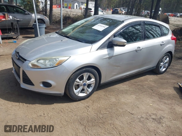 2013 Ford Focus SE with VIN 1FADP3K2XDL104907, listed as a IAAI auction lot 41952204 with 136,970 mi miles. Bid and sale history available at carsss.com. Image 2.
