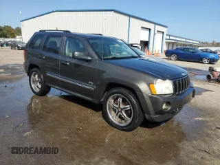 2006 Jeep Grand Cherokee Laredo with VIN 1J4HS48N96C357909, listed as a Copart auction lot 77551154 with 136,235 mi miles and Salvage Title. Bid and sale history available at carsss.com. Image 4.