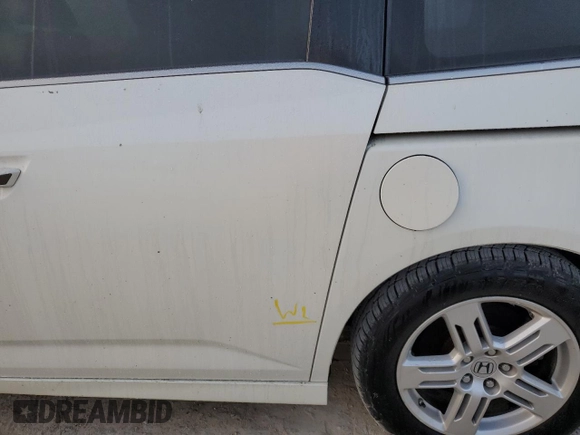2012 Honda Odyssey Touring with VIN 5FNRL5H96CB144690, listed as a Copart auction lot 75176494 with 0 mi miles and Salvage Title. Bid and sale history available at carsss.com. Image 13.