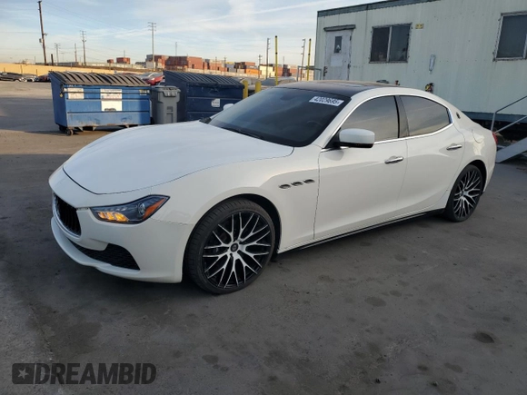 2014 Maserati Ghibli z VIN ZAM57XSA6E1097525, wystawiony jako Copart lot #42029695 z przebiegiem 93 740 mil mil oraz Szkoda całkowita • Salvage title. Historia ofert i sprzedaży dostępna na DreamBid. Obrazek 1.