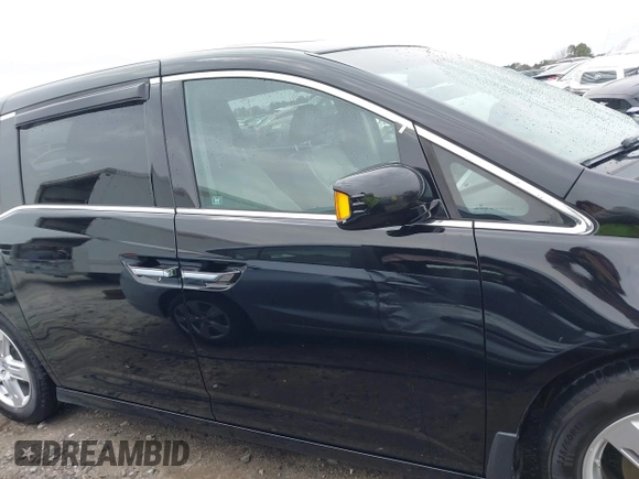 2012 Honda Odyssey Touring with VIN 5FNRL5H96CB058828, listed as a IAAI auction lot 41731389 with 152,295 mi miles and . Bid and sale history available at DreamBid. Image 13.