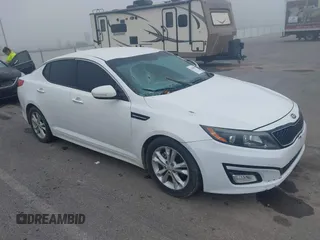 2014 Kia Optima LX with VIN 5XXGM4A71EG303834, listed as a IAAI auction lot 42380350 with 148,359 mi miles and . Bid and sale history available at DreamBid. Image 1.