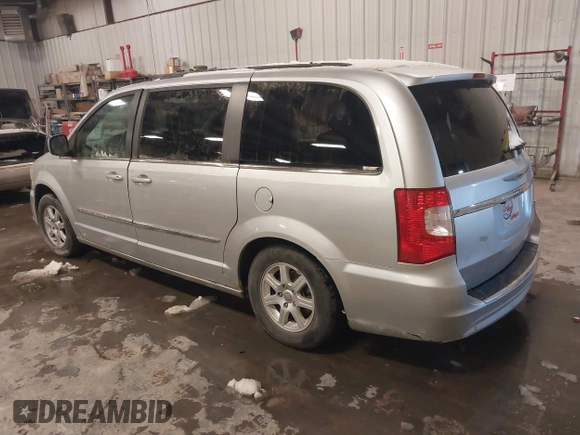 2011 Chrysler Town & Country Touring with VIN 2A4RR5DG0BR735274, listed as a IAAI auction lot 41845820 with 163,440 mi miles and . Bid and sale history available at DreamBid. Image 3.