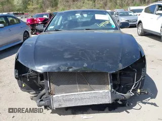 2016 Audi A5 Premium Plus z VIN WAUM2AFR5GA011293, wystawiony jako IAAI lot #41990091 z przebiegiem 131 353 mil mil oraz . Historia ofert i sprzedaży dostępna na DreamBid. Obrazek 12.