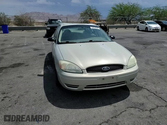 2007 Ford Taurus SE with VIN 1FAFP53U27A156844, listed as a Copart auction lot 59204695 with 157,633 mi miles and Salvage title. Bid and sale history available at DreamBid. Image 13.