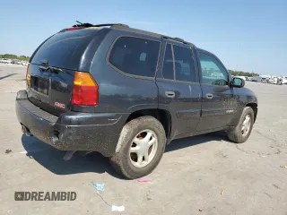 2004 GMC Envoy SLT with VIN 1GKDT13SX42423677, listed as a Copart auction lot 69012884 with Not Provided miles and Clean Title. Bid and sale history available at carsss.com. Image 3.